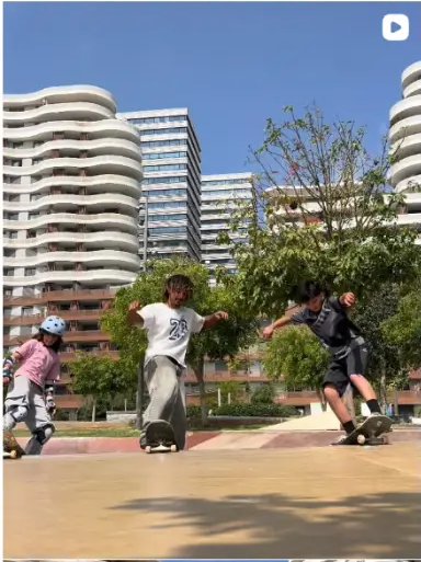 Skaters cruising past modern buildings in Casablanca