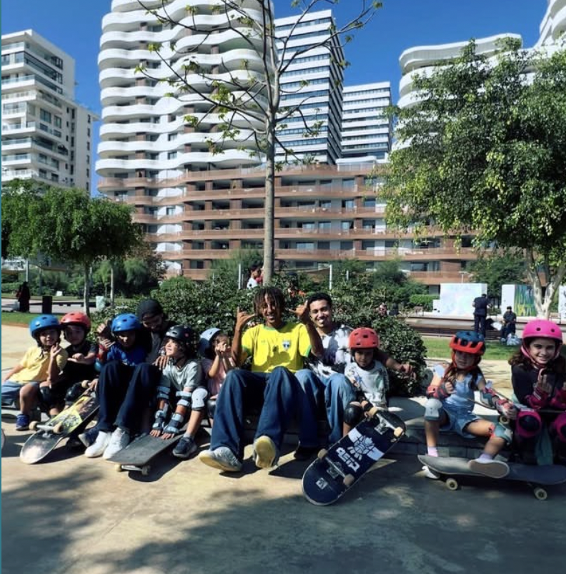 Casa Skate Club group of young skaters and coaches with skateboards at Anfa Park, Casablanca